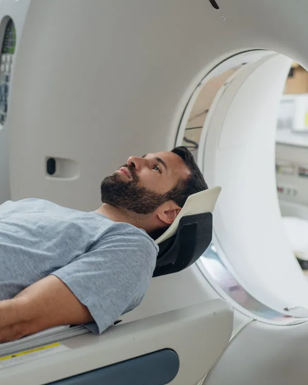 patient lying on the ct scanner